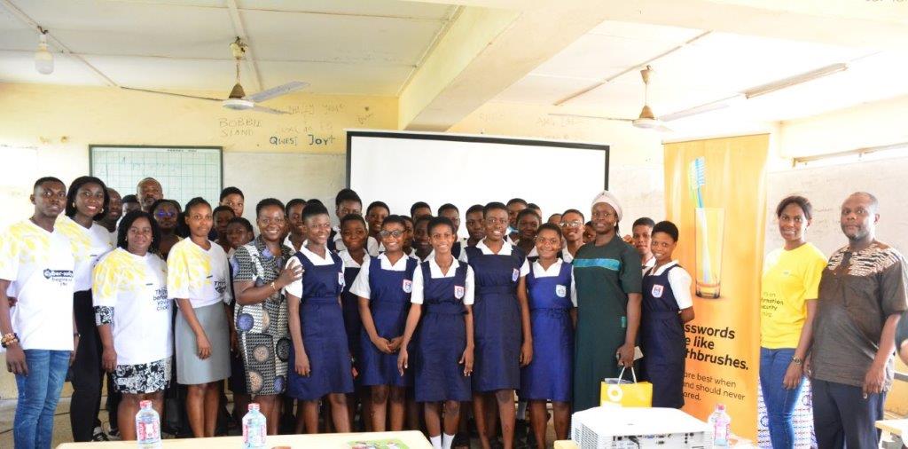 MTN Team in a group picture with some female students after the engagement