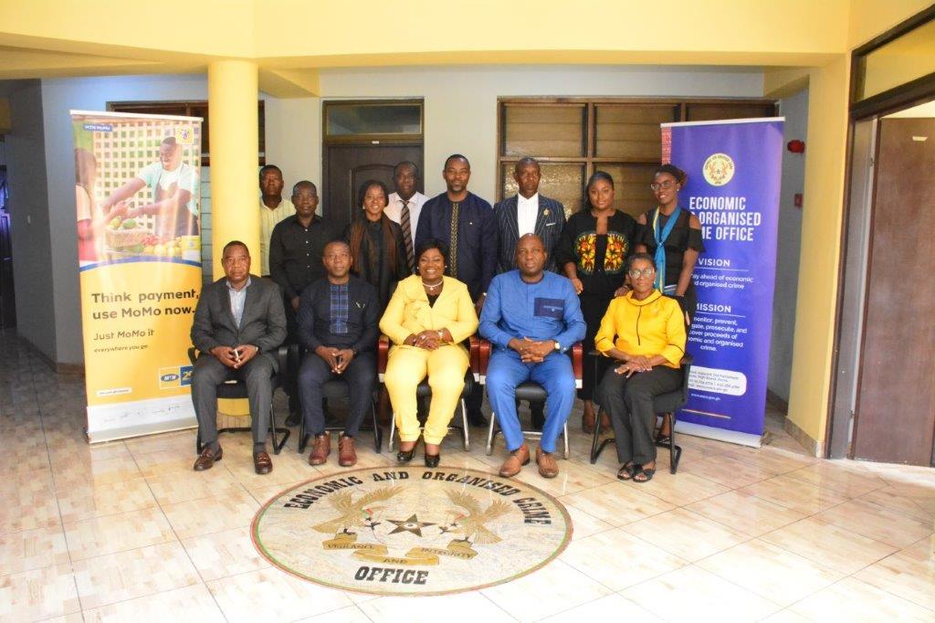 MobileMoney Limited team and EOCO Officials a group picture