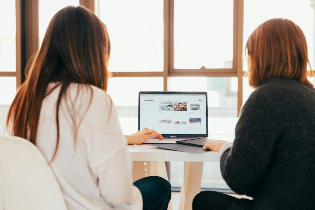 A team goes over their business website.